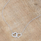 Sweet and Romantic Rhodium Melded CZ Hearts Necklace - Ocean Monroe